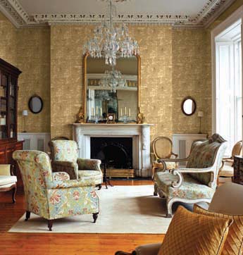 This drawing room has retained the ornate cornice and ceiling plasterwork together with a grand fireplace original to its period